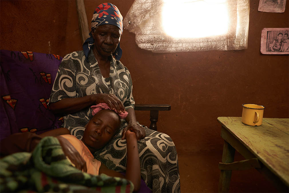 Woman taking care of sick person