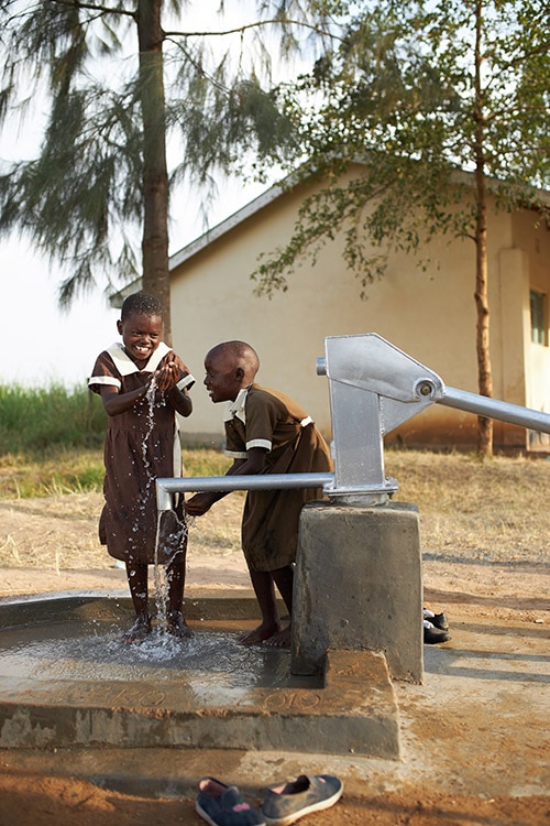 Children enjoying clean water