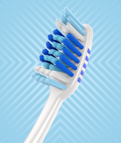 Cleans between teeth and reaches back teeth
